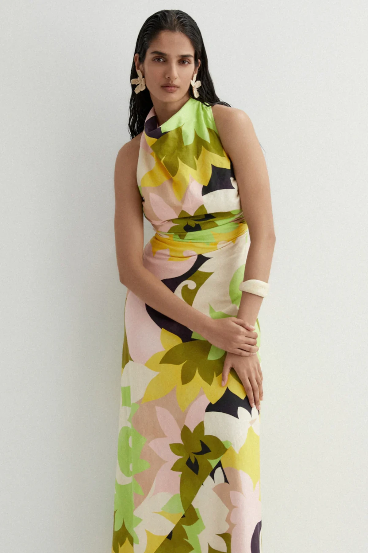 Luna and Bloom Press page image of female model in long colourful floral dress