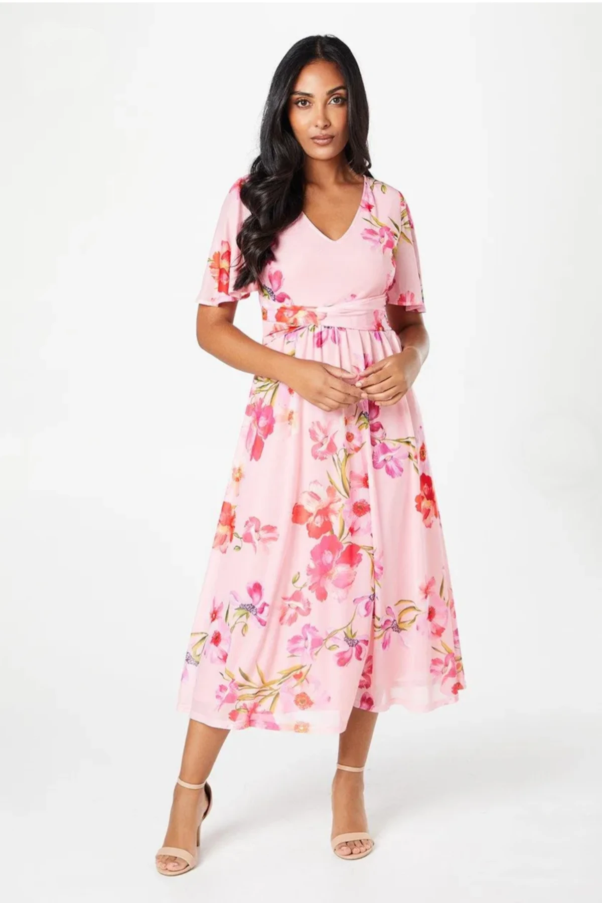 Luna and Bloom Press page image of female model in pink floral fit and flare dress