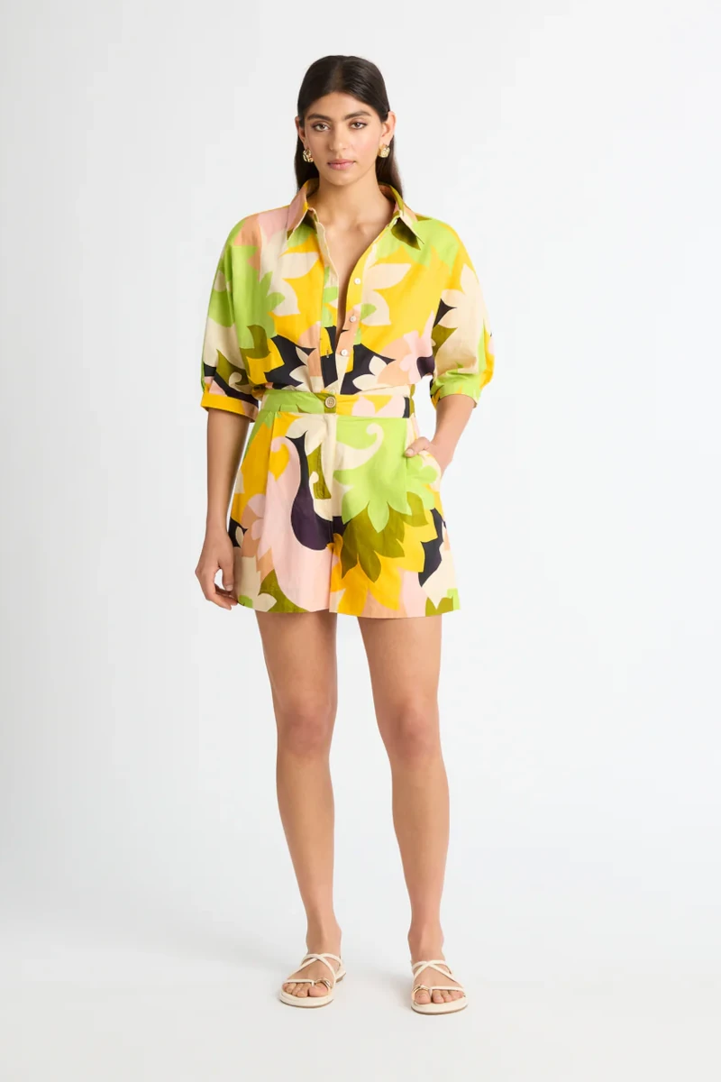 Luna and Bloom Press page image of female model in short colourful floral dress
